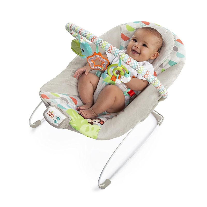 Photo 1 of Bright Starts Happy Safari Vibrating Baby Bouncer Seat with 3-Point Harness and Bar, Age 0-6 Months
