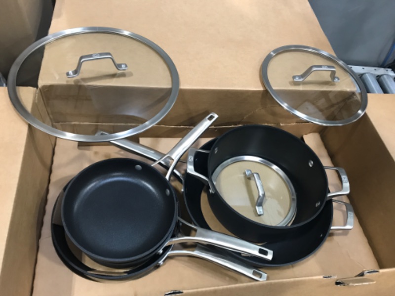 Photo 1 of Calphalon 8-Piece Pots and Pans Set, Nonstick Kitchen Cookware with Stay-Cool Handles, Dishwasher and Metal Utensil Safe, Black 8-Piece Cookware Set