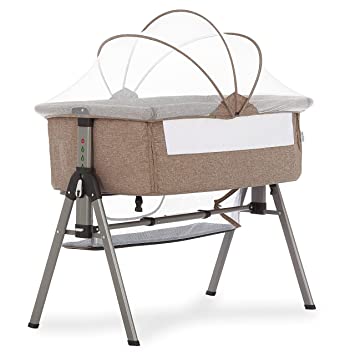 Photo 1 of Dream On Me Lotus Bassinet and Bedside Sleeper in Brown, Lightweight and Portable Baby Bassinet, Adjustable Height Position, Easy to Fold and Carry Travel Bassinet- Carry Bag Included
