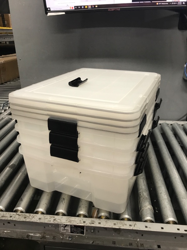 Photo 2 of IRIS USA 41 Quart WEATHERPRO Plastic Storage Box with Durable Lid and Seal and Secure Latching Buckles, Weathertight, Clear with Black Buckles, 4 Pack 41 Qt. -4 Pack