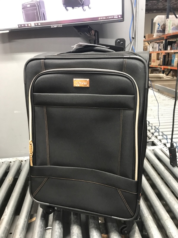 Photo 1 of American Tourister Belle Voyage Softside Luggage with Spinner Wheels, Black, Checked-Medium 25-Inch

