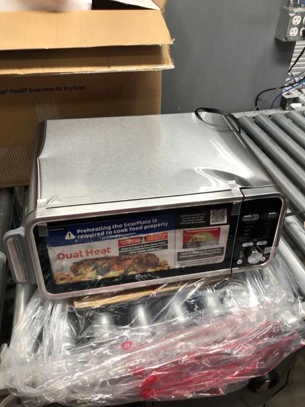 Photo 3 of Ninja SP301 Dual Heat Air Fry Countertop 13-in-1 Oven with Extended Height, XL Capacity, Flip Up & Away Capability for Storage Space, with Air Fry Basket, SearPlate, Wire Rack & Crumb Tray, Silver