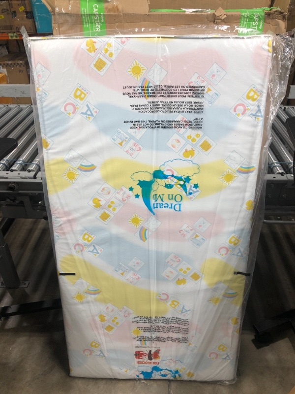 Photo 2 of Dream On Me Asheville 4” Firm Fiber Crib and Toddler Mattress, Waterproof, GreenGuard Gold Certified, Dual-Sided Mattress, White Embossed Cover, Lightweight Reversible Design