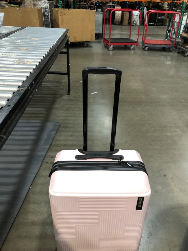 Photo 6 of **minor dent and dirt mark**
American Tourister Stratum XLT Expandable Hardside Luggage with Spinner Wheels, Pink Blush, Checked-Medium 24-Inch
