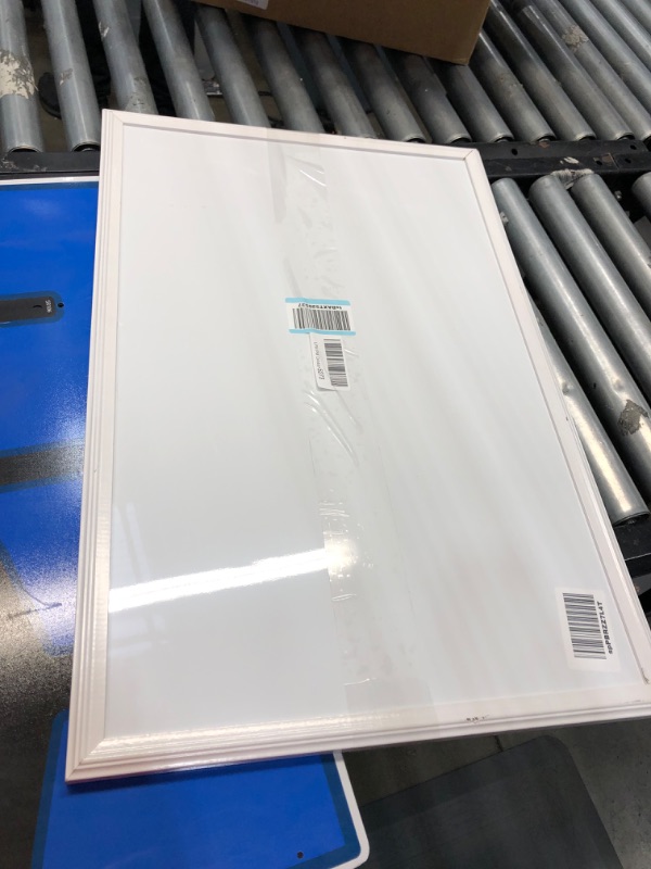 Photo 2 of **MINOR BEND** U Brands Magnetic Dry Erase Board, 20 x 30 Inches, White Wood Frame (2071U00-01) 20'' x 30''
