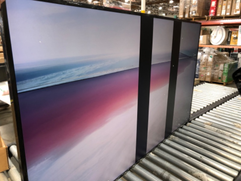 Photo 1 of ***HAS 2 LARGE BLACK LINES ON SCREEN ***SAMSUNG 65" ClassQLED 4K LS03B Series The Frame Quantum HDR,Art Mode,Anti-Reflection Matte Display Screen,Slim Fit Wall Mount Included,Smart TV,Bluetooth with Alexa Built-In(QN65LS03BAFXZA,2022 Model)
