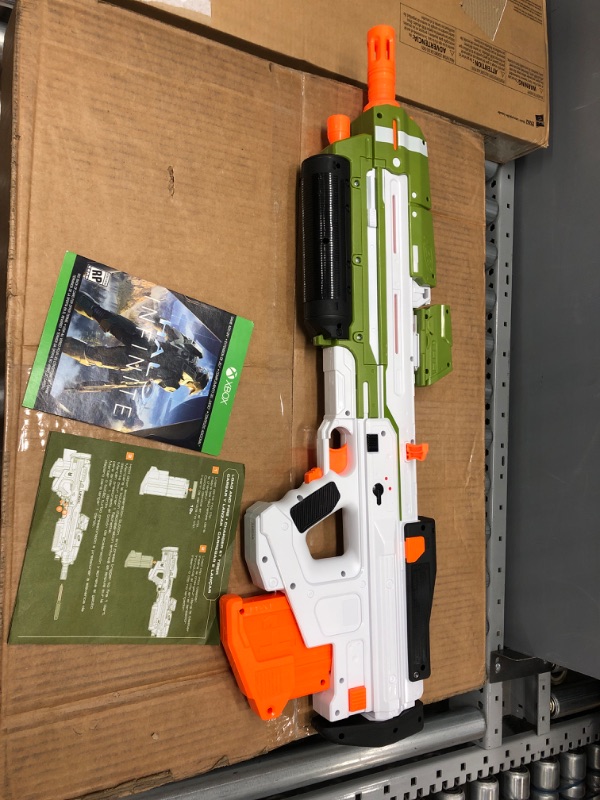 Photo 2 of NERF Halo MA40 Motorized Dart Blaster -- Includes Removable 10-Dart Clip, 10 Official Elite Darts, and Attachable Rail Riser Frustration-Free Packaging