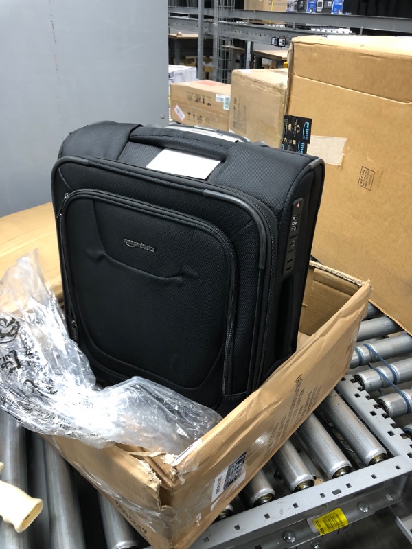 Photo 2 of Amazon Basics Expandable Softside Carry-On Spinner Luggage Suitcase With TSA Lock And Wheels - 20.4 Inch, Black
