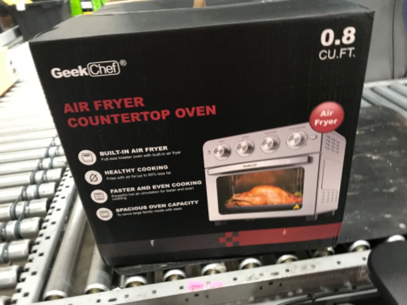 Photo 2 of  TOP OF OVEN IS DENTED  Geek Chef Air Fryer Toaster Oven Combo, 4 Slice Toaster Convection Air Fryer Oven Warm, Broil, Toast, Bake, Air Fry, Oil-Free, Accessories Included (2 Knob 10QT with Video Recipes)
