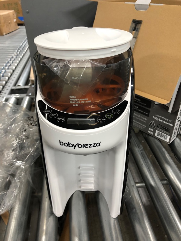 Photo 1 of Baby Brezza Formula Pro Advanced Formula Dispenser Machine - Automatically Mix a Warm Formula Bottle Instantly - Easily Make Bottle with Automatic Powder Blending