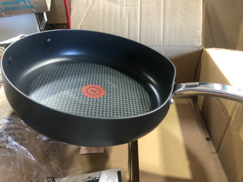 Photo 2 of **SEE NOTE** T-fal C51782 ProGrade Titanium Nonstick Thermo-Spot Dishwasher Safe PFOA Free with Induction Base Saute Pan Jumbo Cooker Cookware, 5-Quart, Black
