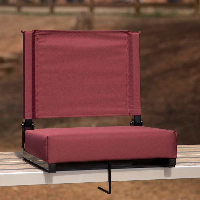 Photo 1 of Flash Furniture Grandstand Comfort Seats by Flash - Maroon Stadium Chair - 500 lb. Rated Folding Chair - Carry Handle - Ultra-Padded Seat
