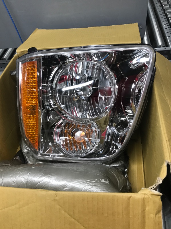 Photo 2 of Dorman 1592160 Driver Side Headlight Assembly Compatible with Select GMC Models