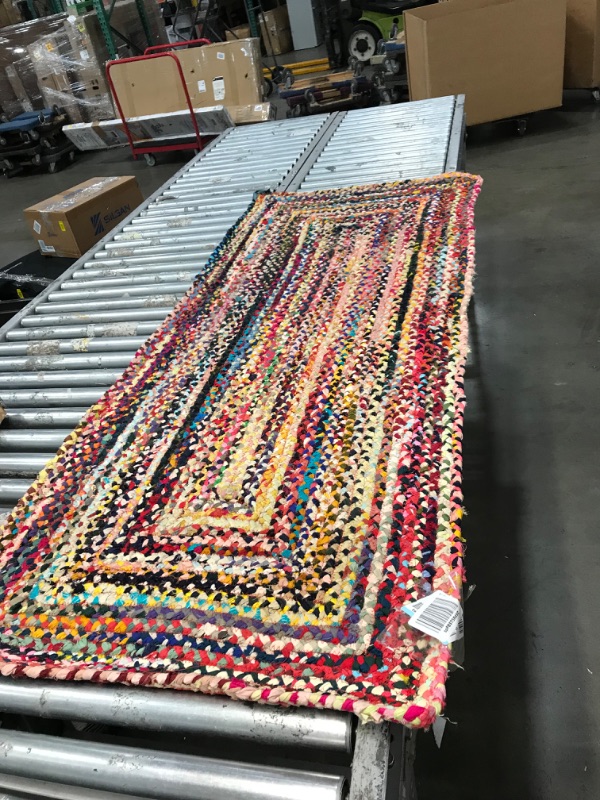 Photo 2 of **used needs cleaning***
30in x 72in multi color design rug, view photos