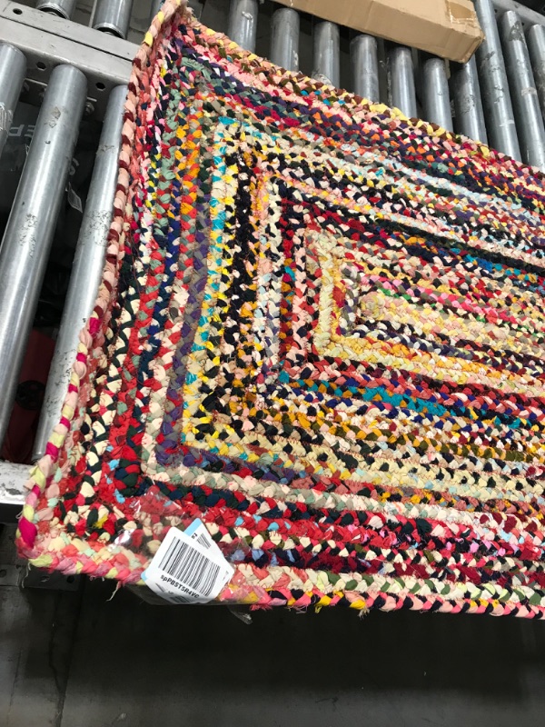 Photo 4 of **used needs cleaning***
30in x 72in multi color design rug, view photos