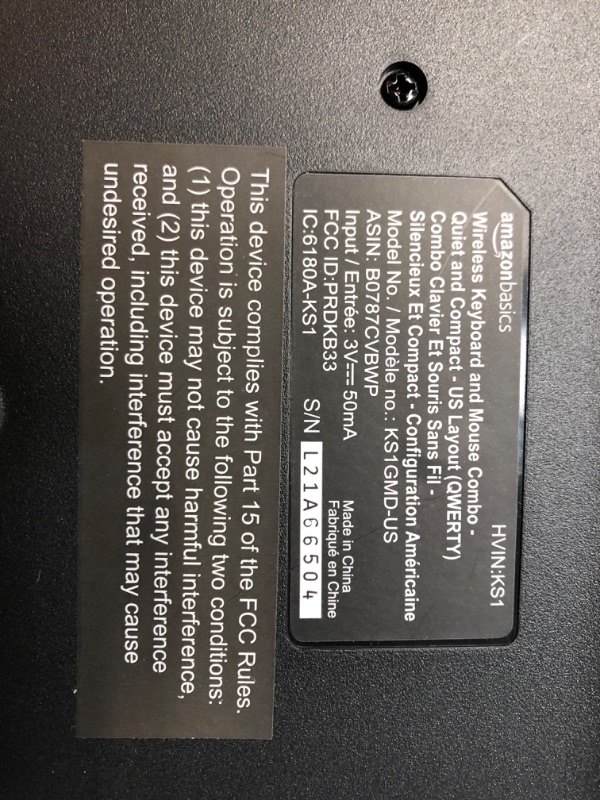 Photo 1 of Amazon Basics Wireless Computer Keyboard and Mouse Combo - Quiet and Compact - US Layout (QWERTY)