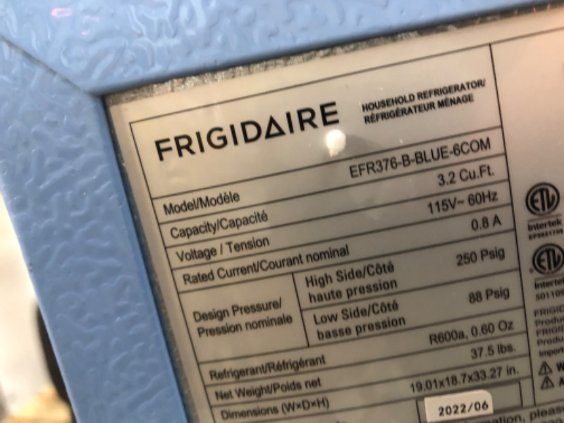 Photo 6 of Frigidaire EFR376-BLUE 3.2 Cu Ft Blue Retro Bar Fridge with Side Bottle Opener
