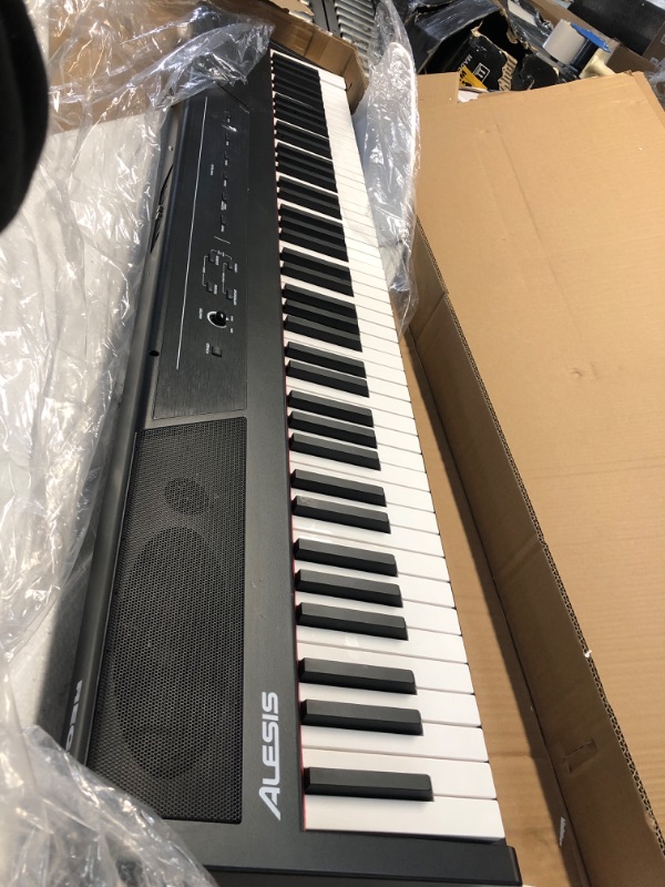 Photo 1 of Alesis Recital – 88 Key Digital Piano Keyboard with Semi Weighted Keys, 2x20W Speakers, 5 Voices, Split, Layer and Lesson Mode, FX and Piano Lessons
