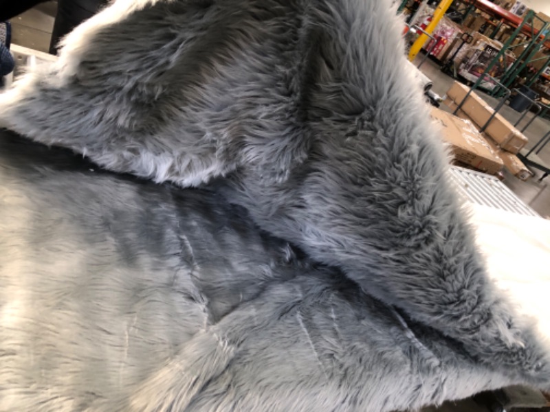 Photo 1 of 6X8 FT FUZZY RUG -GREY 