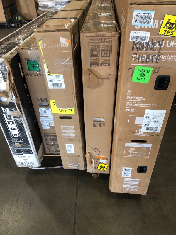 Photo 1 of MIXED PALLET OF DAMAGED TVS**SET OF 5**NON FUNCTIONAL** NO REFUNDS**