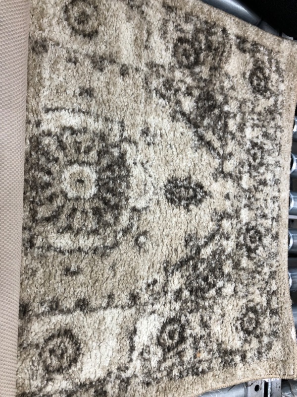 Photo 1 of 2' x 6' brown/beige runner rug 