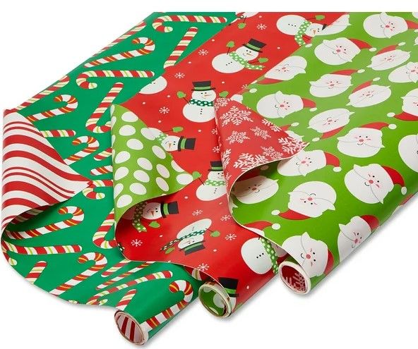Photo 1 of American Greetings Christmas Extra-Wide Reversible Wrapping Paper, Santa, Snowmen and Candy Canes, 3-Roll, 40", 120 Total Sq. Ft.
