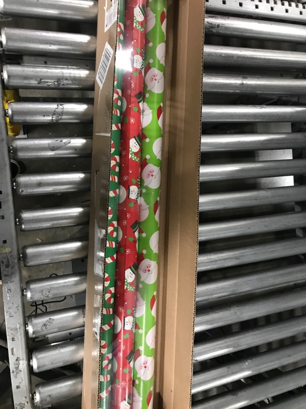 Photo 2 of American Greetings Christmas Extra-Wide Reversible Wrapping Paper, Santa, Snowmen and Candy Canes, 3-Roll, 40", 120 Total Sq. Ft.
