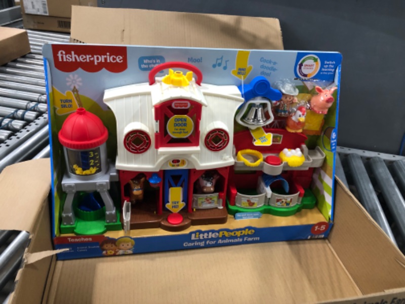 Photo 2 of Fisher-Price Little People Farm Toy, Toddler Playset with Lights Sounds and Smart Stages Learning Content, Frustration-Free Packaging
