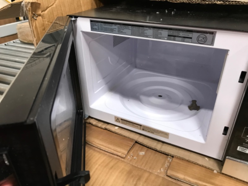 Photo 4 of **PARTS ONLY** TOSHIBA EM131A5C-SS Countertop Microwave Oven, 1.2 Cu Ft with 12.4" Turntable, Smart Humidity Sensor with 12 Auto Menus, Mute Function & ECO Mode, Easy Clean Interior, Stainless Steel & 1100W

