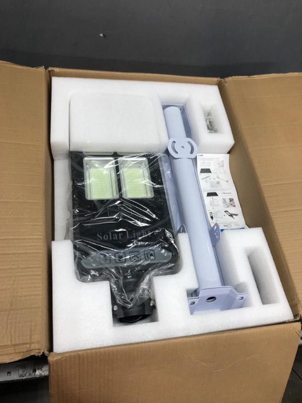 Photo 2 of **USED RETURN ITEM** 400W Solar Street Lights Outdoor, NIORSUN Motion Sensor Dusk to Dawn Solar Security Flood Lights with Remote IP67 Waterproof for Parking Lot, Backyard, Driveway, Stadium, Garden(Bright White)