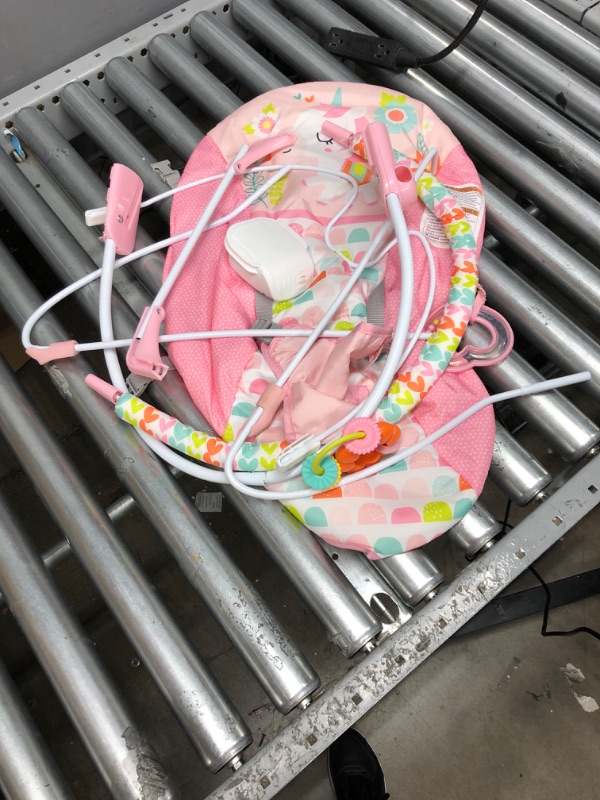 Photo 2 of Bright Starts Flamingo Vibes 3-Point Harness Harness Vibrating Baby Bouncer with -Toy bar
