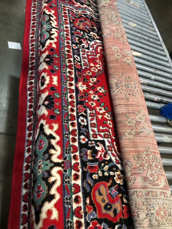 Photo 1 of **Used & needs cleaning*
7'8 x10'7 green red and white style design rug, view photos**