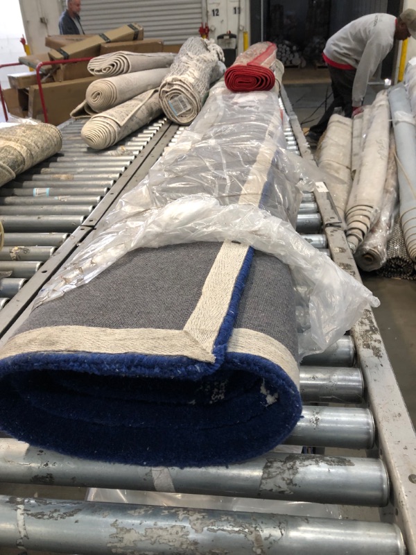 Photo 1 of **Used & needs cleaning**
nuLOOM Octopus Tail Abstract Wool Area Rug, 6' x 9', Navy
