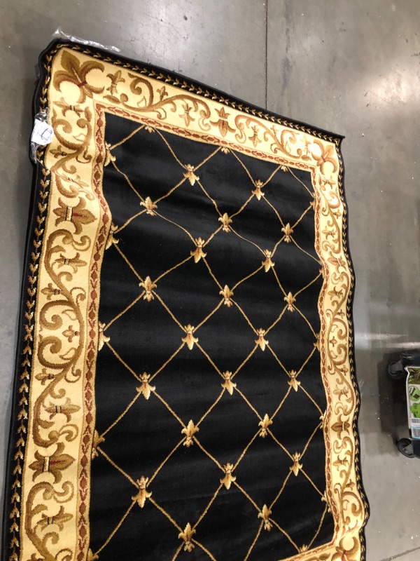 Photo 1 of 62" W X 90' L BLACK AND GOLD STYLE RUG 