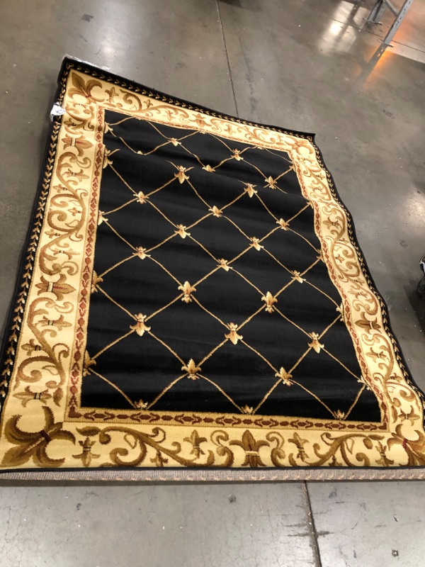 Photo 2 of 62" W X 90' L BLACK AND GOLD STYLE RUG 