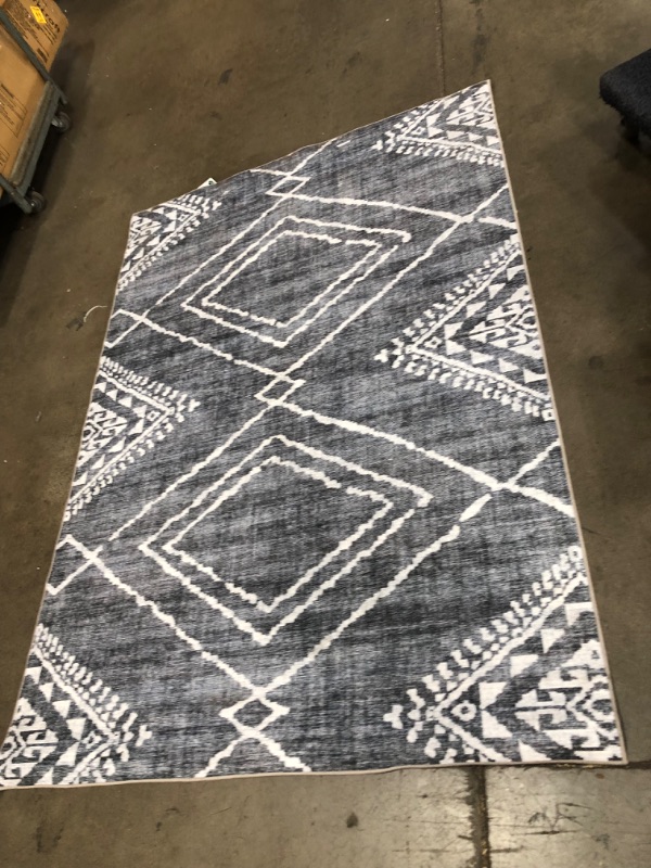 Photo 3 of **USED**
57'W X 83' L DARK BLUE AND WHITE STYLE RUG, VIEW PHOTOS FOR DETAIL