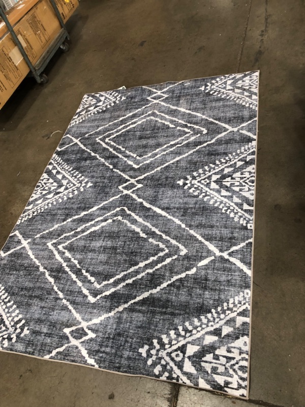 Photo 2 of **USED**
57'W X 83' L DARK BLUE AND WHITE STYLE RUG, VIEW PHOTOS FOR DETAIL