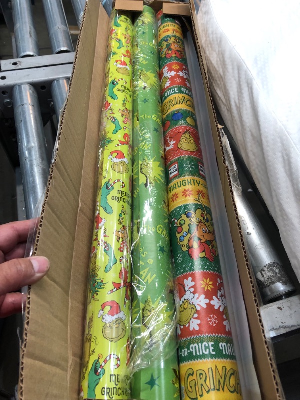 Photo 2 of American Greetings Christmas Wrapping Paper with Cut Lines Bundle, The Grinch (3 Rolls, 105 sq. ft.)
