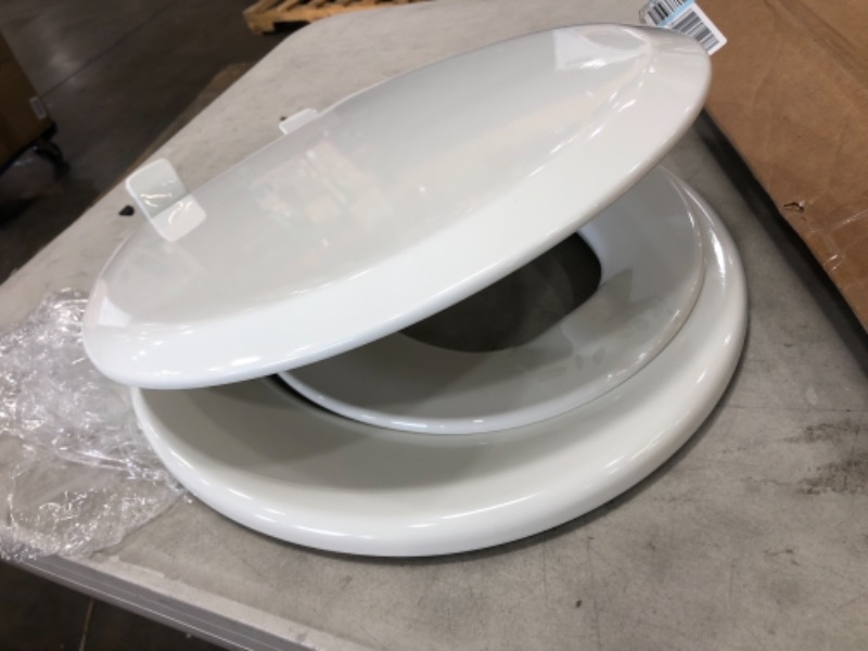 Photo 2 of **MISSING HARDWARE** MAYFAIR 888SLOW 000 NextStep2 Toilet Seat with Built-In Potty Training Seat, Slow-Close, Removable that will Never Loosen, ROUND, White
