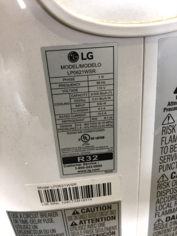 Photo 2 of **HEAVY USE* MISSING PARTS* LG 6,000 BTU (DOE) / 8,000 BTU (ASHRAE) Portable Air Conditioner, Cools 250 Sq.Ft. (10' x 25' room size), Quiet Operation, LCD Remote, Window Installation Kit Included, 115V
