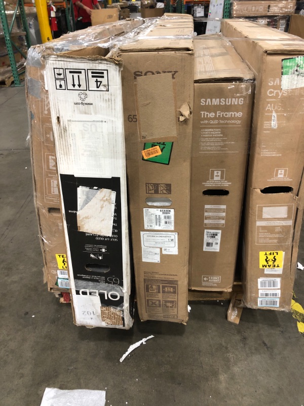 Photo 1 of MIXED PALLET OF DAMAGED TVS**SET OF 5 *NON FUNCTIONAL NO REFUNDS** 