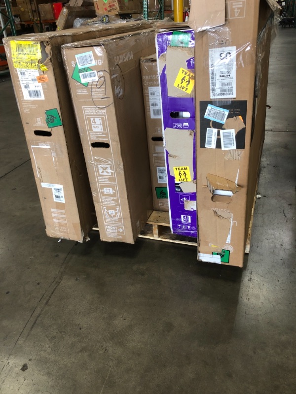 Photo 1 of MIXED PALLET OF DAMAGED TVS**NO REFUNDS**5 UNITS NON FUNCTIONAL**