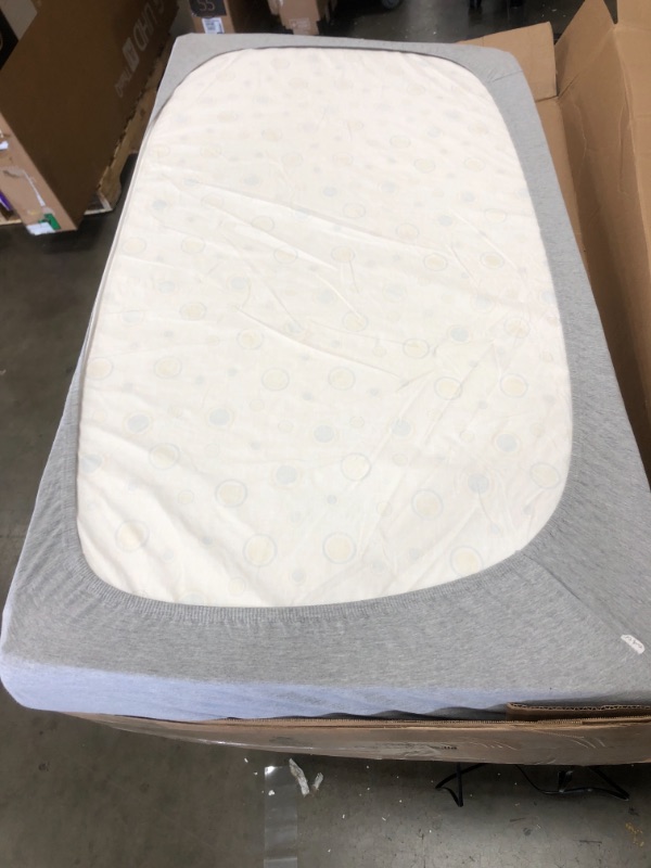 Photo 2 of Delta Children Twinkle Stars Dual Sided - Premium Sustainably Sourced Fiber Core Crib and Toddler Mattress - Waterproof - GREENGUARD Gold Certified (Non-Toxic) - 7 Year Warranty - Made in USA
