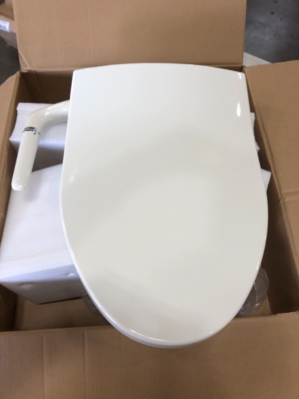 Photo 2 of **MISSING PARTS** Kohler K-5724-96 Puretide Elongated Manual Bidet Toilet Seat, White With Quiet-Close Lid And Seat, Adjustable Spray Pressure And Position, Self-Cleaning Wand, No Batteries Or Electrical Outlet Needed Biscuit Elongated Toilet Seat