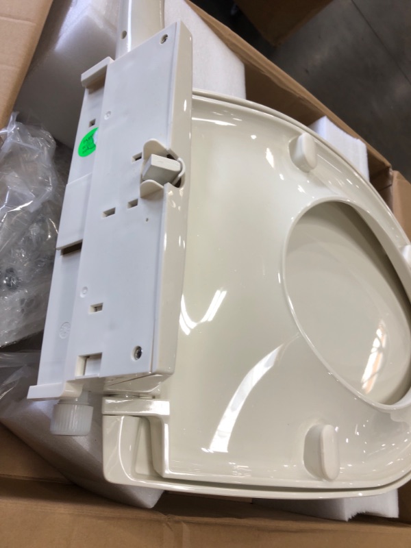 Photo 4 of **MISSING PARTS** Kohler K-5724-96 Puretide Elongated Manual Bidet Toilet Seat, White With Quiet-Close Lid And Seat, Adjustable Spray Pressure And Position, Self-Cleaning Wand, No Batteries Or Electrical Outlet Needed Biscuit Elongated Toilet Seat