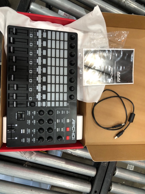 Photo 5 of DID NOT POWER ON***
AKAI Professional APC40MKII - USB MIDI Controller for Mac / PC with Clip Launch Matrix, Knobs & Faders, and Pro Software Suite Included Assorted Colors