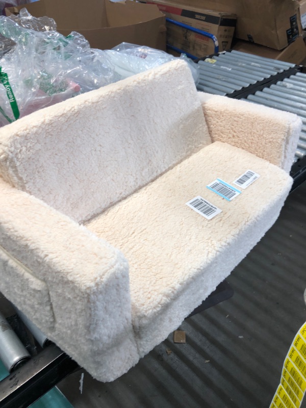 Photo 1 of Delta Children Cozee Flip-Out Sherpa 2-in-1 Convertible Sofa to Lounger for Kids, Cream