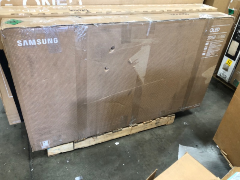 Photo 1 of PALLET OF 5 DAMAGED TVS NO REFUNDS OR RETURNS 