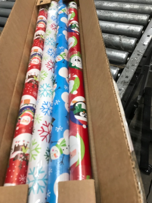 Photo 2 of American Greetings Reversible Christmas Wrapping Paper, Santa, Snowflakes and Snowmen (4 Pack, 160 sq. Ft.)
