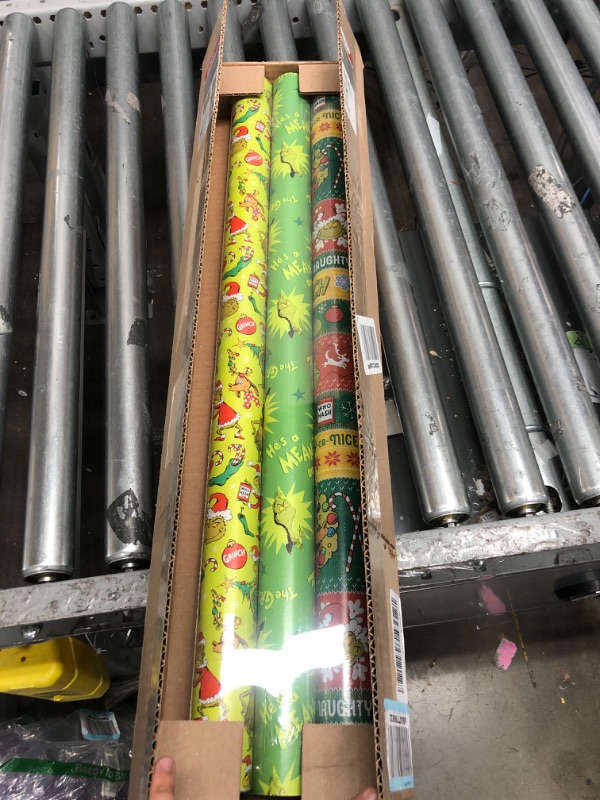 Photo 2 of American Greetings Christmas Wrapping Paper with Cut Lines Bundle, The Grinch (3 Rolls, 105 sq. ft.)